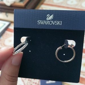 Swarovski earrings.